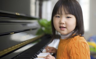 young girl at piano